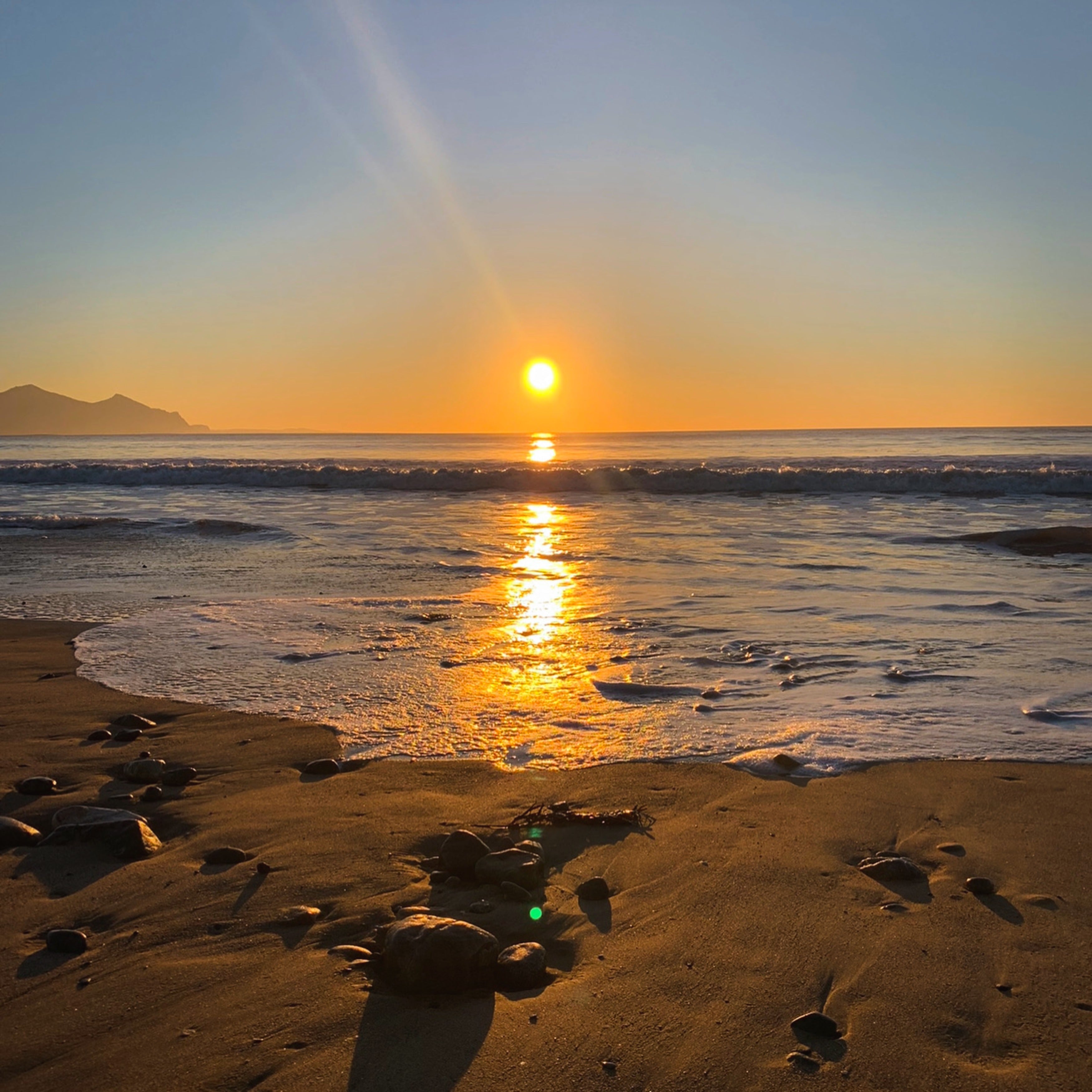 Dinas Dinlle Sunset Greetings Card. 150mm x 150mm