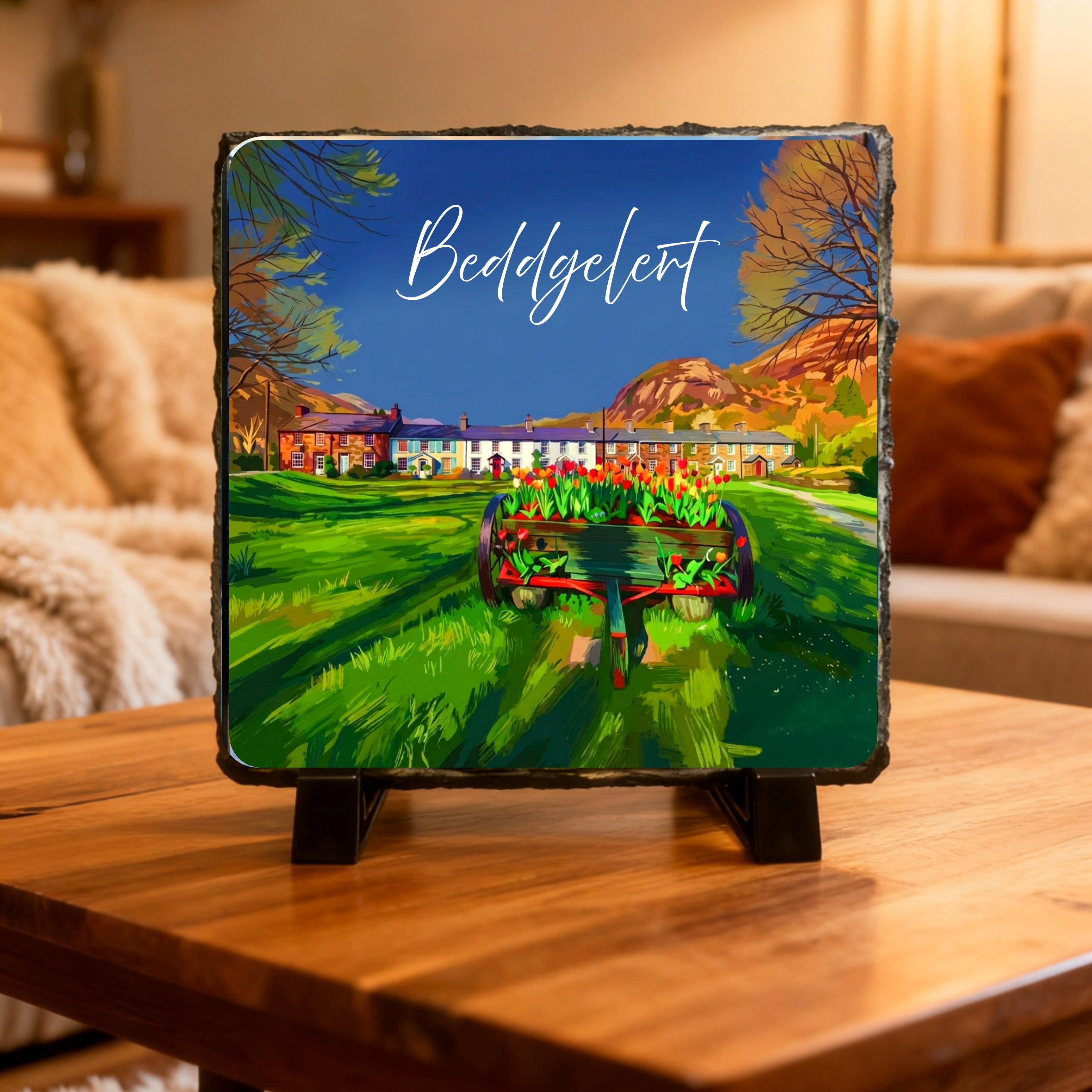image on slate, comes with stands and boxed. 14cm x 14cm Beddgelert and Watkin Pool.
